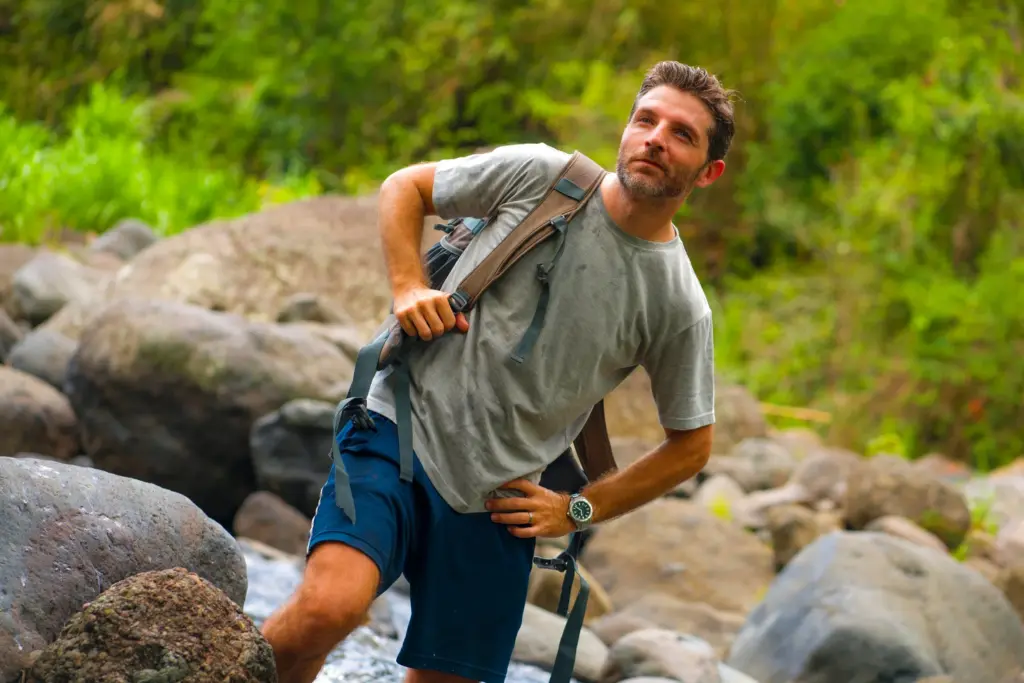 Man hiking among large rocks