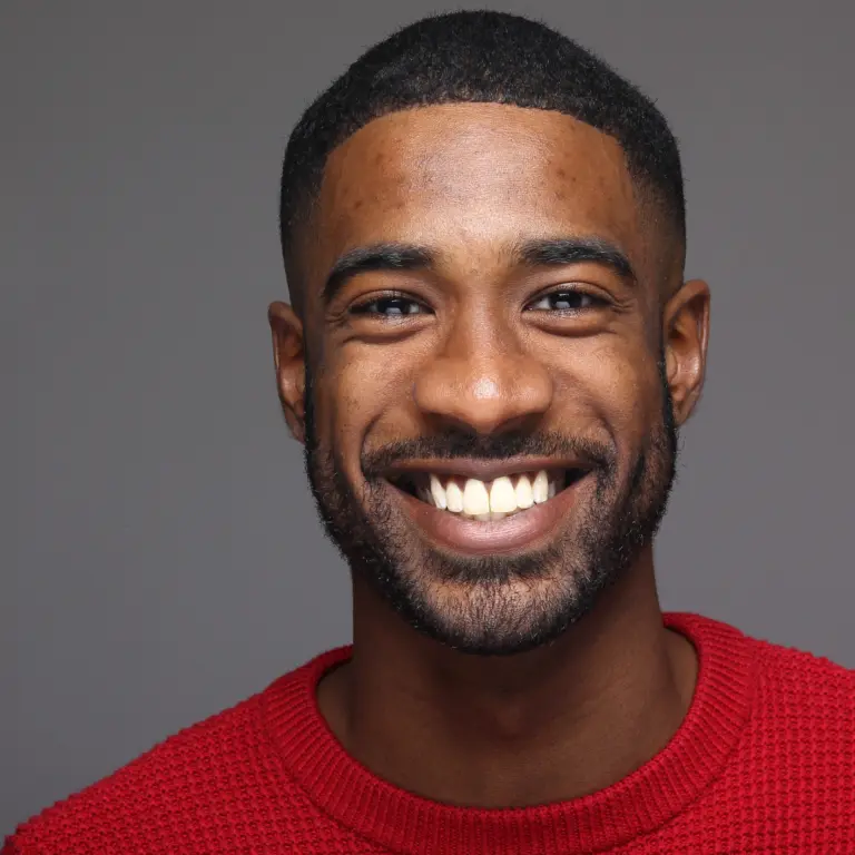 Smiling young man in a red shirt